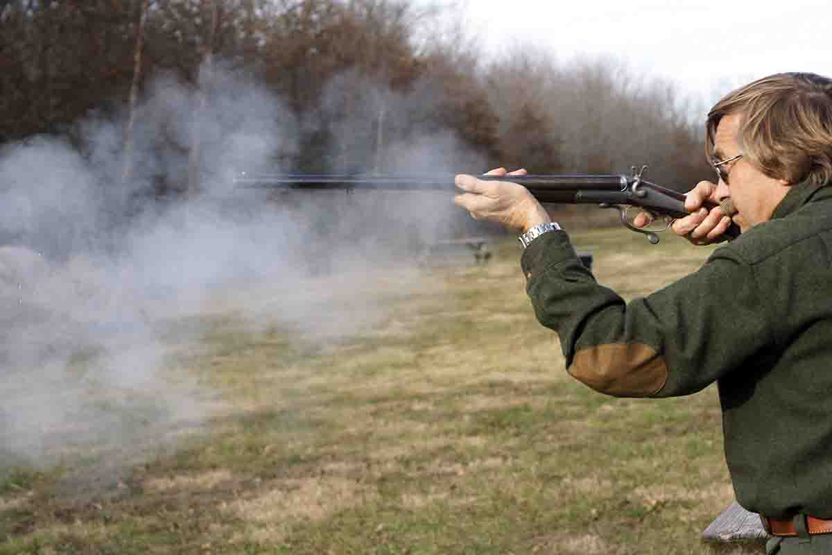 Shooting the “Little Thug,” an E.M. Reilly that began life in 1868 as a .577 Snider double rifle and was later bored out to become a 20-gauge double. Firing a 350-grain round ball at 666 fps, it is a fearsome short-range firearm.